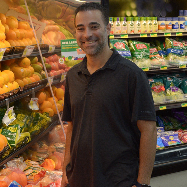 Vincent Nona, Store Manager of Parkway Foods in Detroit, Michigan.